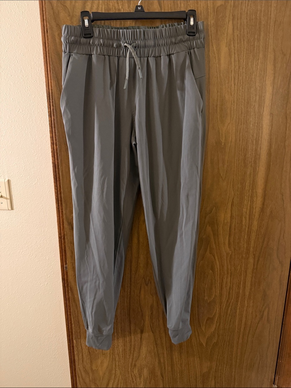 Only worn and washed once; side medium jogger pants